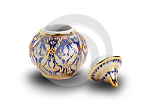 Handmade colorful Thai porcelain design in five colors called Benjarong on white background with clipping path