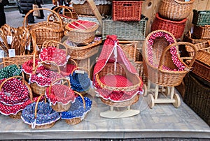Handmade colorful wicker baskets and cradle