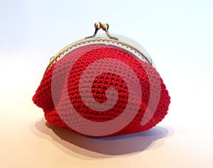 Handmade crochet purse with cotton thread in red color photo