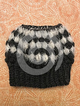 Handmade Crochet Black and White Bulky Yarn Messy Bun Hat photo