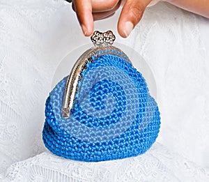 Handmade crochet purse with cotton thread in blue color photo
