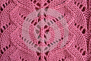 Handmade delicate pink openwork knitting.