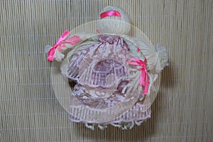 Handmade doll is souvenir and charm for home photo