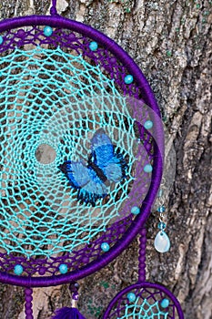 Handmade dream catcher with feathers threads and beads rope hanging