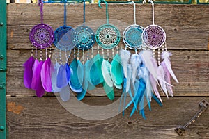 Handmade dream catcher with feathers threads and beads rope hanging