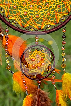 Handmade dream catcher with feathers threads and beads rope hanging