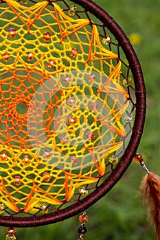 Handmade dream catcher with feathers threads and beads rope hanging