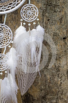 Handmade dream catcher with feathers threads and beads rope hanging