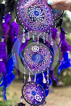 Handmade dream catcher with feathers threads and beads rope hanging