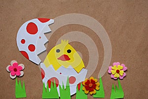 Handmade Easter decoration. Greeting card with chicken. Childrens DIY concept, gift with your own hands. Hobby, paper crafts at