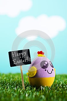 Text happy easter and handmade easter egg