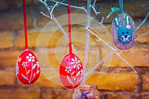 Handmade easter egg decoration with green leaves