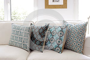 Handmade Embroidered Pillows on Sofa