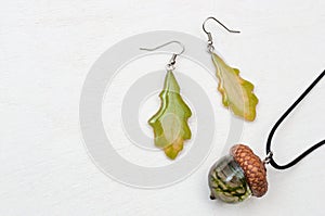 Handmade epoxy resin jewelry. oak leaf earrings. acorn pendant.