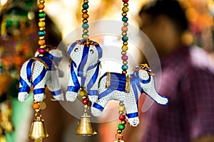 Handmade figurines of elephants, diwali or deepavali decor on street market.