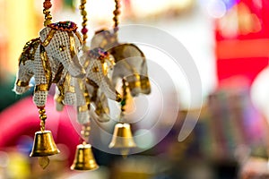 Handmade figurines of elephants, diwali or deepavali decor on street market.