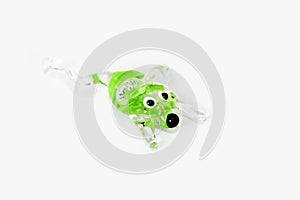 Handmade green glass mouse on white background