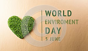 A handmade green heart on dark background. World environment day, earth day, save earth and eco concept