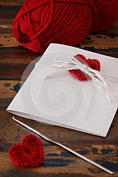 Handmade greetings card with red crochet heart for Saint Valenti
