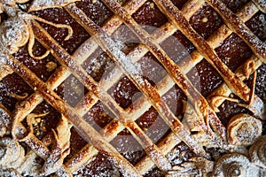 Handmade jam pie on an iron tray