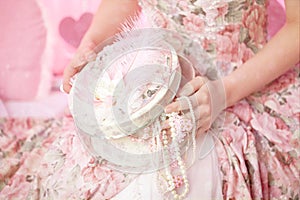 Handmade jewelry box in woman's hands.