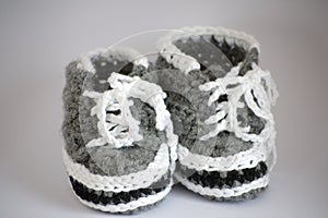 Handmade knitted baby bootees