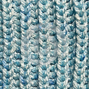 Handmade knitted fabric blue wool background texture