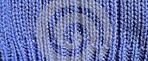 Handmade knitted fabric blue wool background texture