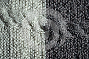 Handmade knitted fabric grey white wool background texture