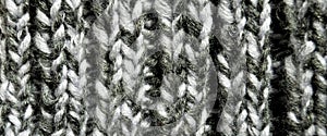 Handmade knitted fabric grey wool background texture