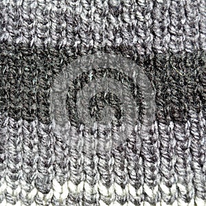 Handmade knitted fabric grey wool background texture