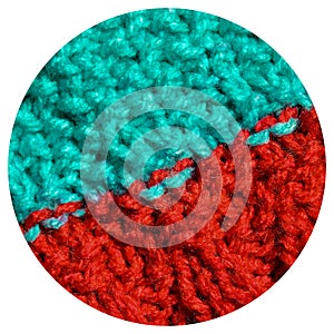Handmade knitted fabric red and turquoise wool background texture
