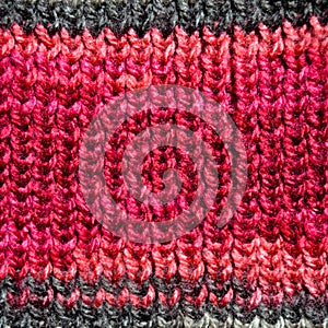 Handmade knitted fabric red wool background texture