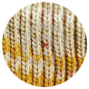 Handmade knitted fabric yellow and beige wool background texture