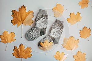 Handmade knitted socks for the cold season. View from above. Many different blue color socks.