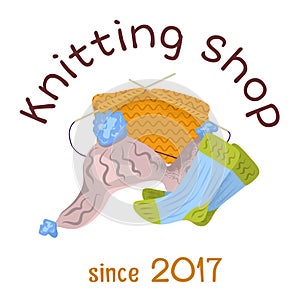 Handmade knitting shop logo colorful wool socks, yarn, needles. Cozy craft store emblem since