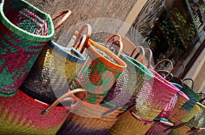 Handmade lady bags shown on street photo