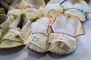 Handmade leather Native American Indian moccasins at a powwow in San Francisco