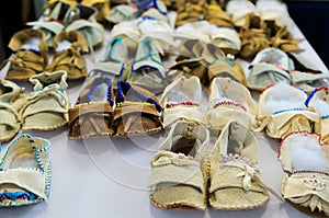 Handmade leather Native American Indian moccasins at a powwow in San Francisco