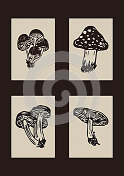 Handmade linocut mushroom motif clipart in folkart scandi style. Set of simple monochrome block print shapes with