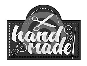 HANDMADE logo or label with scissors and needle and thread