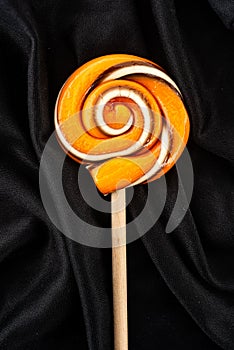 Handmade lollipop in Halloween colors