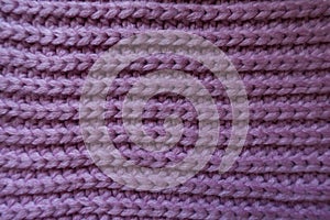 Handmade mauve knitted fabric with horizontal ribbing pattern