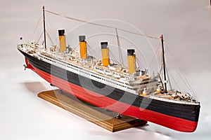 Handmade model of Titanic. Beautiful Handmade model of Titanic isolated on white background photo