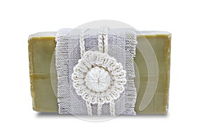 Handmade, natural organic olive oil soap isolated on white. Spa bath accessories, feminine care products. Hygiene concept photo. H