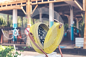 Handmade natural organic rattan handbag. Tropical island of Bali. Eco-bag concept. Ecobags from Bali.