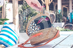 Handmade natural organic rattan handbag. Tropical island of Bali. Eco-bag concept. Ecobags from Bali.