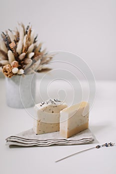 Handmade natural soap bars on white background. Soap making. copyspace, flat lay, top view