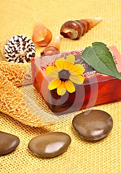 Handmade natural soap, shells and pebbles