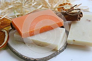 Handmade natural soap on wooden background. Spa natural treatments